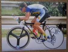greg lemond in full contraol during the race tour de france signed 11x8 photo
