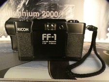 Ricoh FF-1 35mm film camera fixed 35mm f/2.8 Color Rikenon lens. NOT TESTED