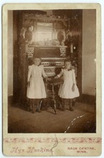 TWINS AND PUMP ORGAN MUSICAL