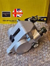 fits: PEUGEOT XPS 50 STREET EVO FRONT BRAKE CALIPER WITH BRAKE PADS SILVER UK:-)