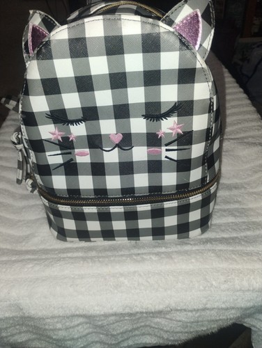 Black and white checkered cat - black,