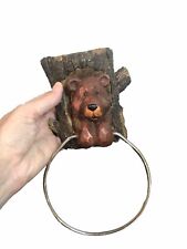 Rustic Bear in Tree Trunk