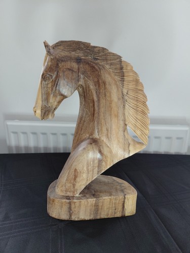 Hand carved wooden horse head - hand,