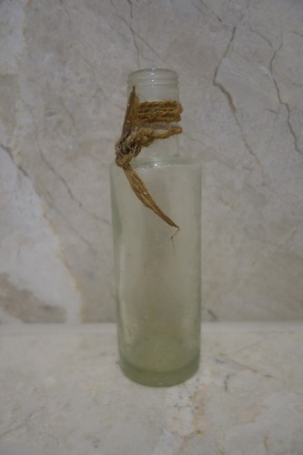 Old clear glass bottle - clear,