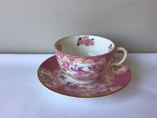 ANTIQUE MINTON PINK COCKATRICE CUP AND SAUCER 9646