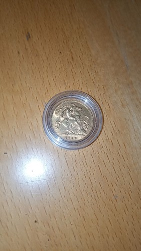 1910 half sovereign gold coin - half,