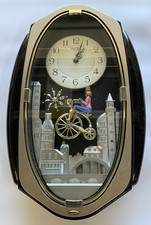SMALL WORLD RHYTHM PENNY-FARTHING MOTION MUSIC CLOCK, 4MH691, HIGH WHEEL BIKE