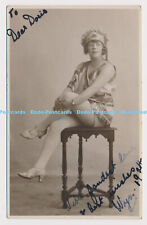 C025002 Woman is sitting on a chair. Stoke on Trent. Burton. Worchester. 1924