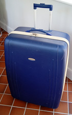Revelation Large Blue Hard Shell Suitcase with wheels and retractable handle