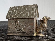 Silver dog with kennel