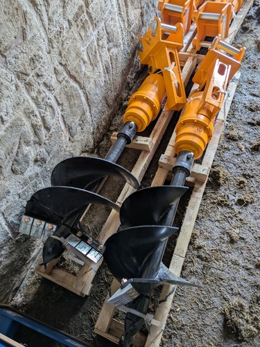 Hydraulic excavator augers