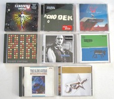 A Bundle of 8 Original CD's