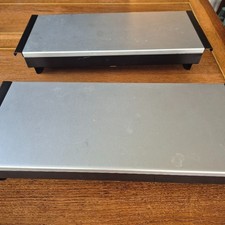 Two stylish food warmers using