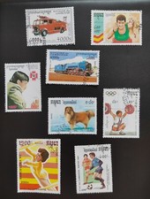 Collection Eight Used Postage Stamps Cambodia Fire Engine Steam Train Sport Dog