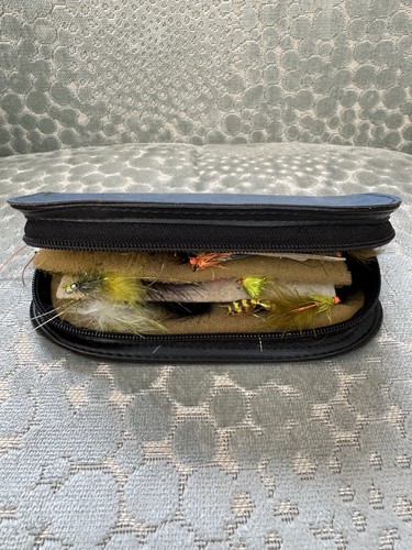 Fly fishing flies with - fly, wallet