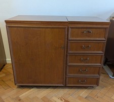 Horn sewing machine cabinet