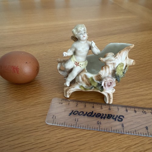 Antique vintage cherub think - cherub.,