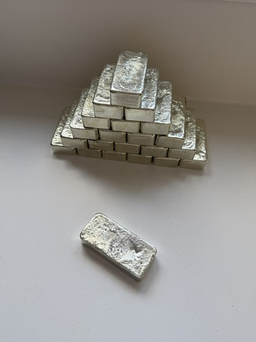 Hand poured tin - poured,