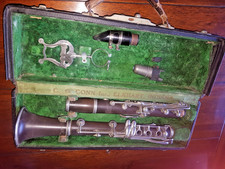 Vintage clarinet, military, rare B-low by C G Conn. In case.