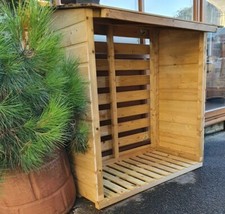 Tanalised wooden log store - tanalised,