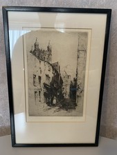 This vintage etching, signed