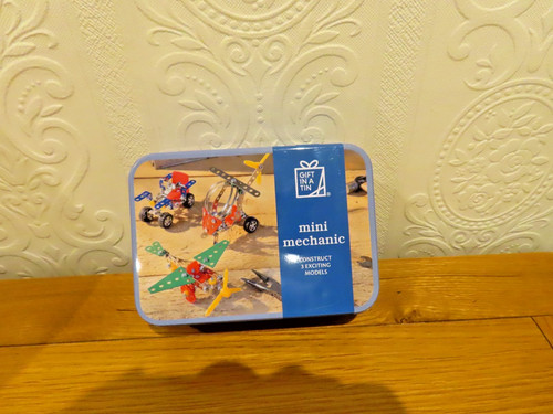 Build gift tin - -, in