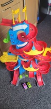 Fisher price car park - car,