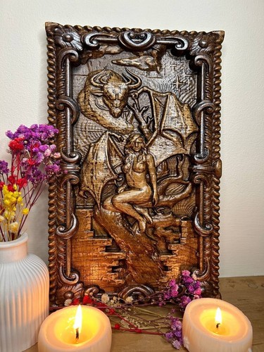 Dragon and lady carved - and, wall