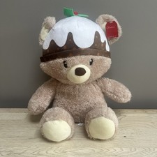 CLINTONS  CHRISTMAS TEDDY BEAR WEARING A  XMAS PUDDING HAT 13”  With Tag