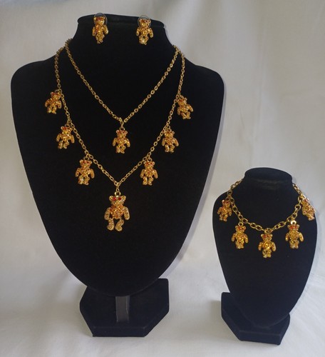Butler and wilson - gold, tone