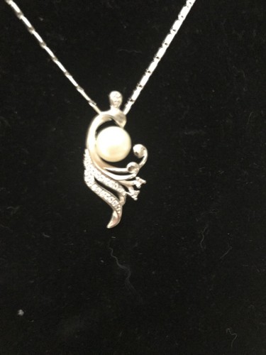Uniquely designed silver swann - uniquely,