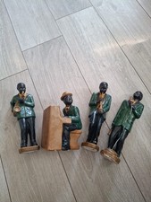 Set Of 4 Figurines Depicting A