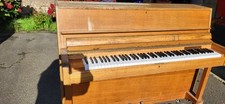 Danemann Upright School Piano In Need of Reburishment.