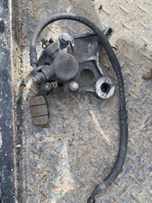 HONDA CBR600F REAR BRAKE CALIPER AND MOUNT 1998 F3