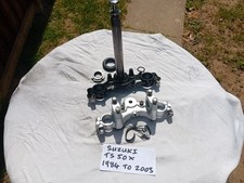 SUZUKI TS50X FRONT FORK YOKES