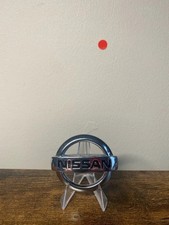 Small Nissan round car badge