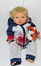 Vynil cloth bodied. Handsome little chappy baby boy doll by Tiny Treasures.