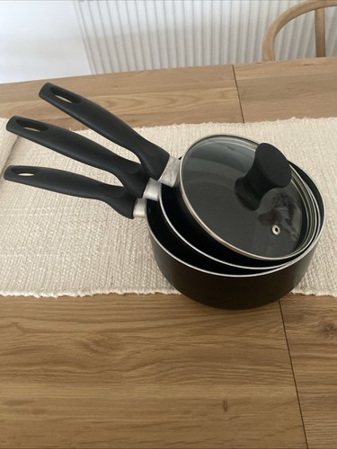 Set saucepans and one - of,