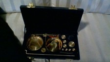 Set of portable brass scales