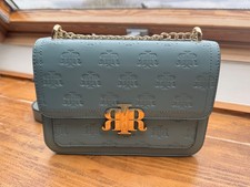 River Island Logo Blue Cross