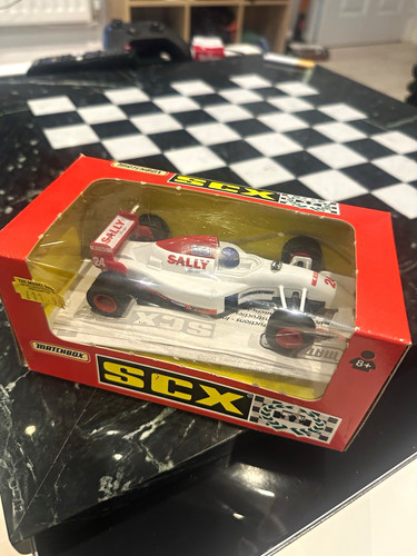 Scx slot car sally - f1/a1,