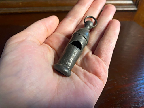 Antique round pea whistle - round,