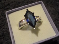 1 x Beautiful Silver Tone Dress Ring/Sapphire Blue Colour Stone/approx Size O