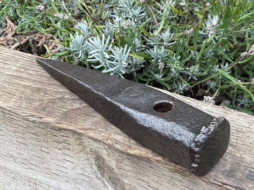 Vintage log splitting wedge - log,