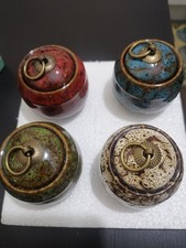 Set of 4 Small Ceramic Jars
