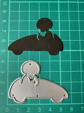 Child playing peddle car metal - car,