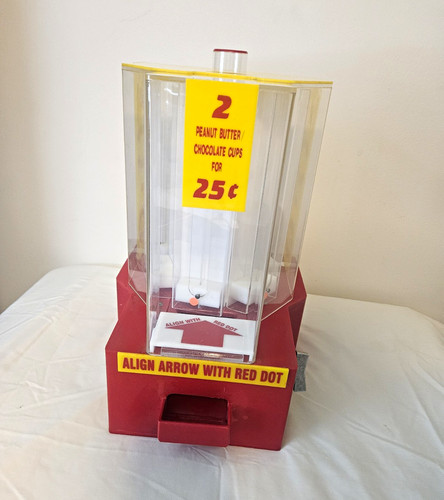 Coin operated candy - 25¢, coin-operated