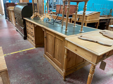 An enormous antique pine partners desk