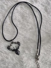 Dark Stag Pendant In A Leather