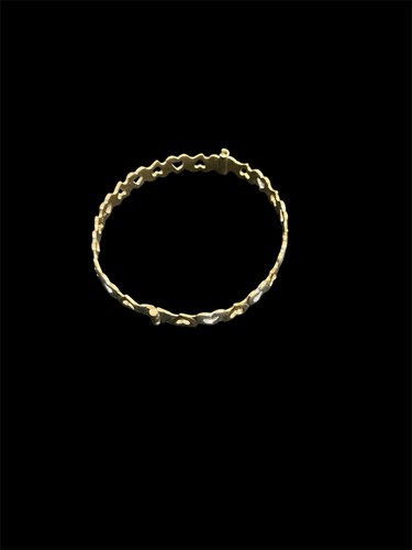 Rolled gold bangle with - rolled,